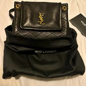 New YSL mini Nolita handbag. Worn once. Comes with box and dust bag
